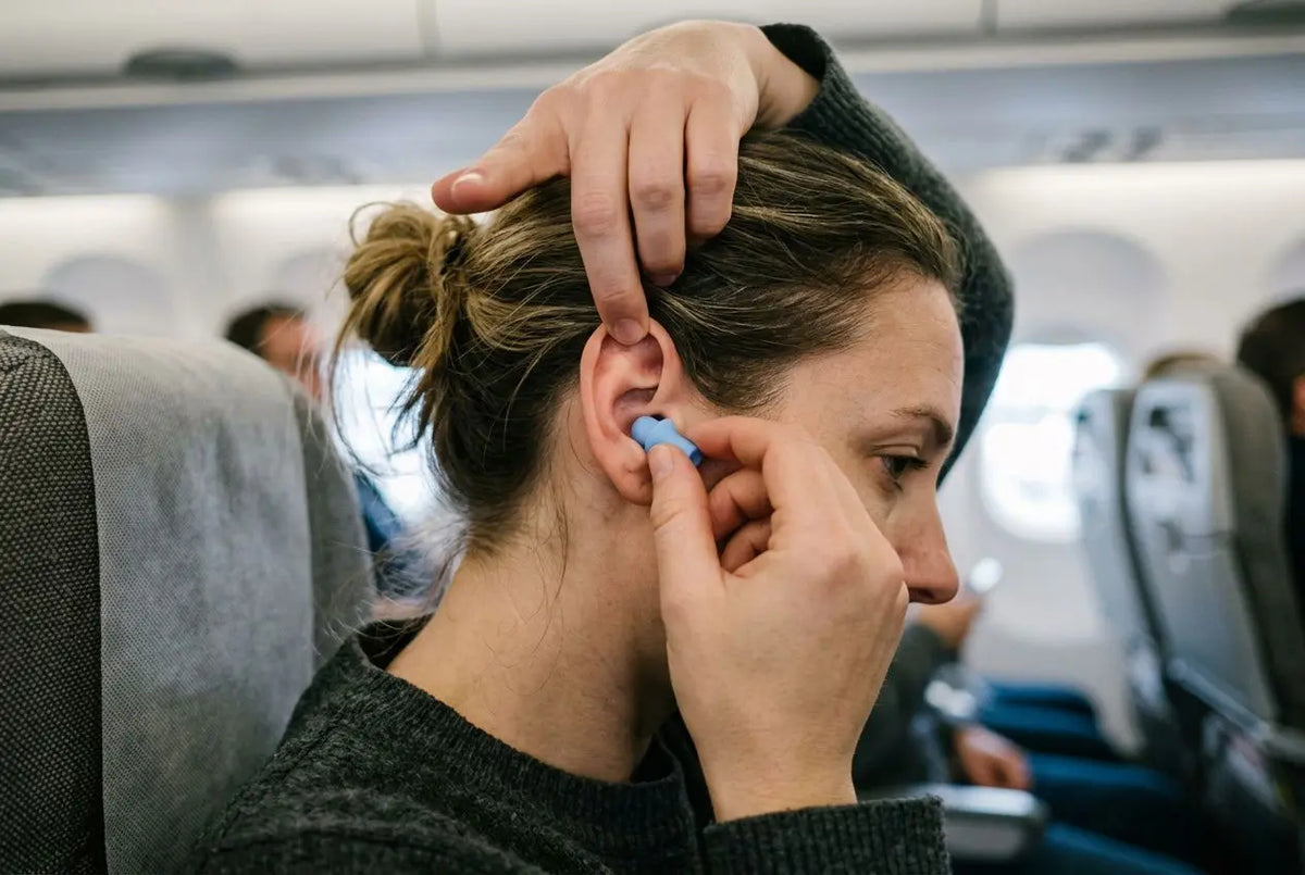 Comment bien mettre des bouchons d'oreille en avion